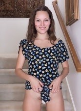 Pussy pics of petite brunette getting naked on the stairs