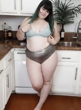 Fat brunette demonstrates bushy cunt in her favorite room